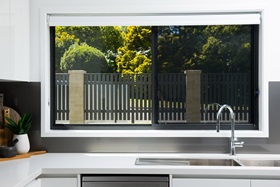 Protec sliding security screen window in kitchen