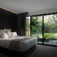 Small image of bedroom with glass sliding door protected by Prowler Proof ForceField security screen 