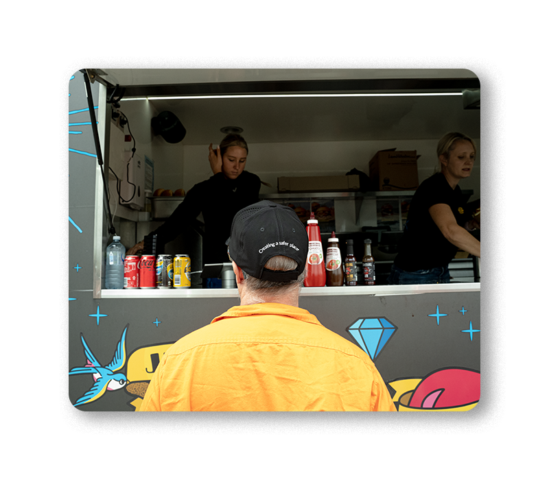 Prowler Proof Employee Ordering from Food Truck with Creating a Safer Place Hat