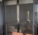 Large diamond grill sliding doors