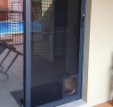 ForceField sliding door with pet flap